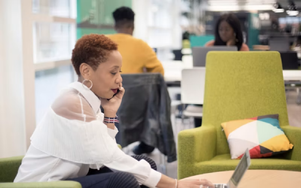 Woman on a phone call sitting in an office